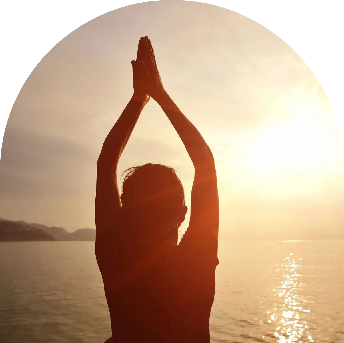 A person is doing yoga in the sun